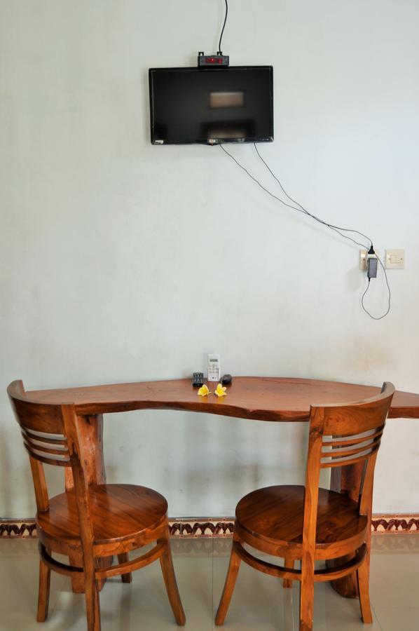 Simpang Inn Sakti Bagian luar foto