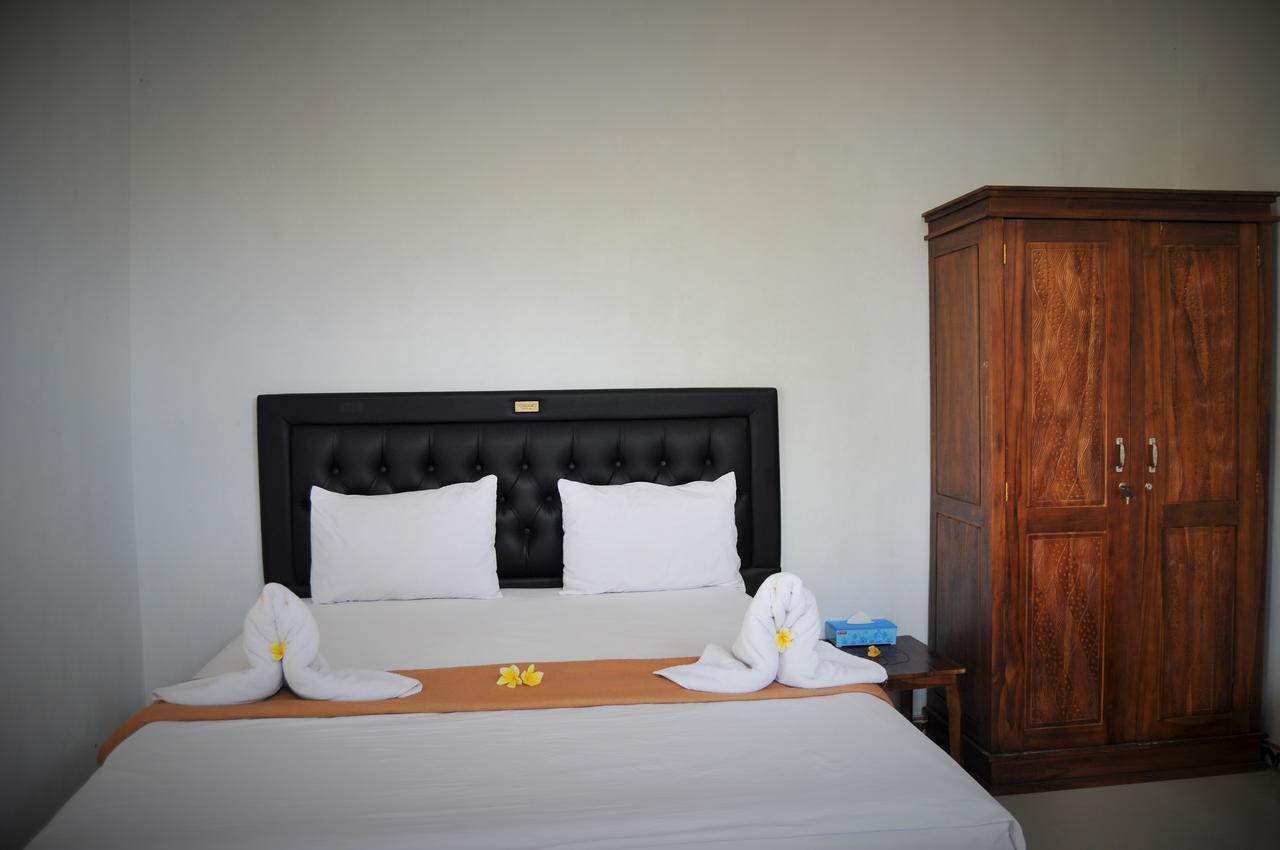 Simpang Inn Sakti Bagian luar foto