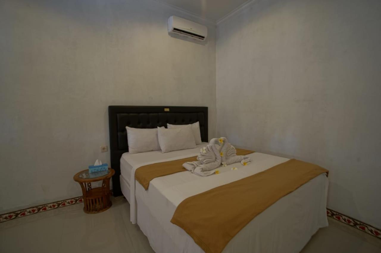 Simpang Inn Sakti Bagian luar foto